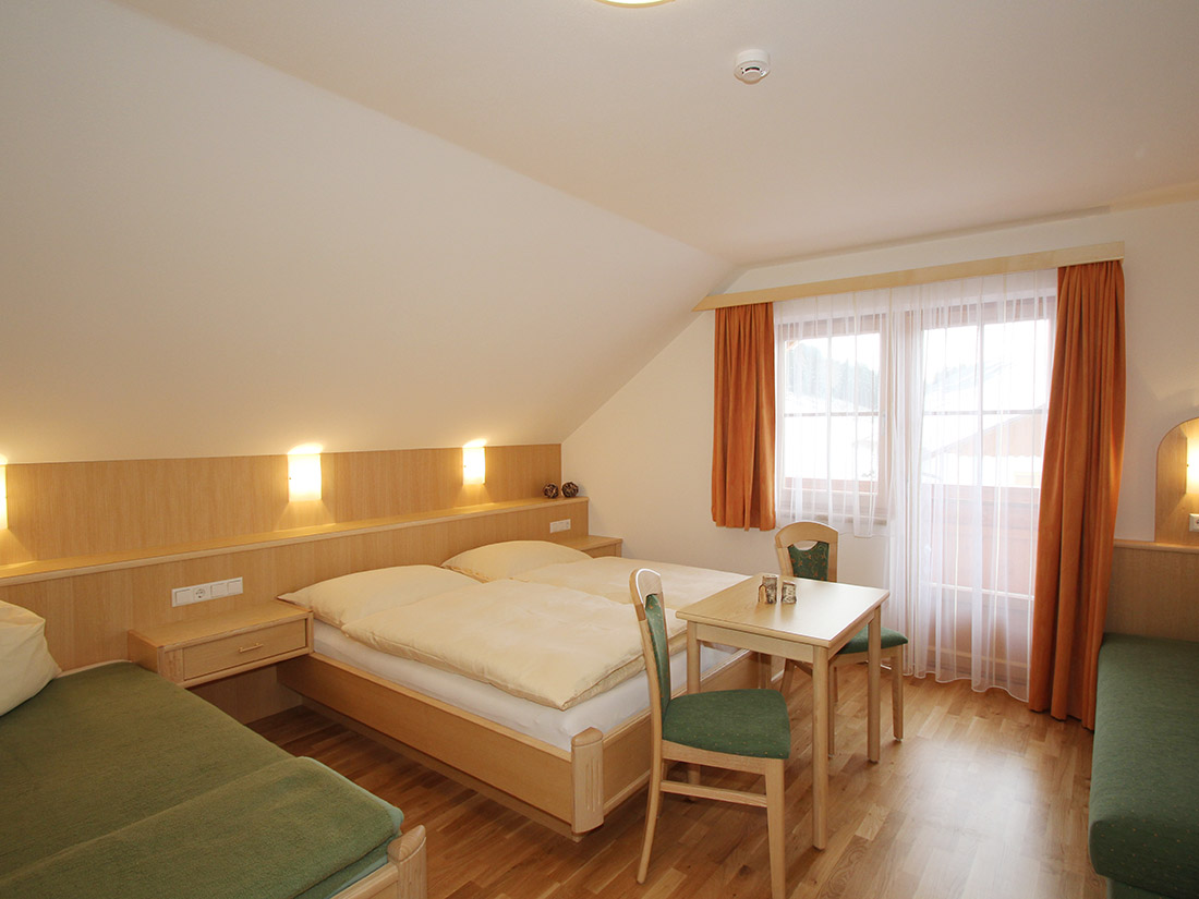 Double bed with sofa bed and balcony in the Mitterberg flat